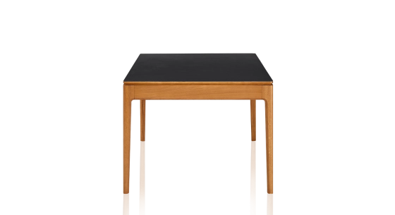 8 person oak and ceramic dining table with cherry-stained wood and plain black ceramic top 180x100 cm