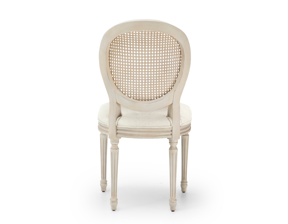 Louis XVI style antique chair wood with white cerused finish, caned backrest, and beige chevron fabric seat. Louis XVI style antique chair wood with white cerused finish, caned backrest, and beige chevron fabric seat.