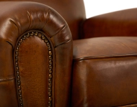 Leather club armchair vintage brown studded armrests Leather club armchair vintage brown studded armrests