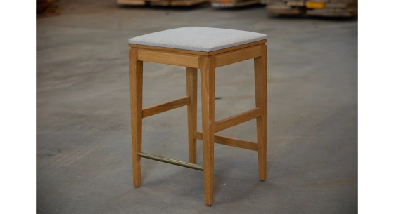 Design bar stool H65 cm natural wood finish with beige fabric seat