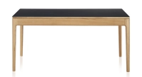 Extendable table for 6 to 10 people in oak and ceramic with wooden extensions with natural stained wood and plain black ceramic top 140x90 cm Extendable table for 6 to 10 people in oak and ceramic with wooden extensions with natural stained wood and plain black ceramic top 140x90 cm