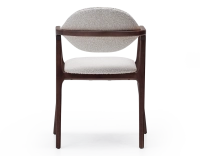 Designer armchair dark brown stained wood and white bouclé fabric. Designer armchair dark brown stained wood and white bouclé fabric.
