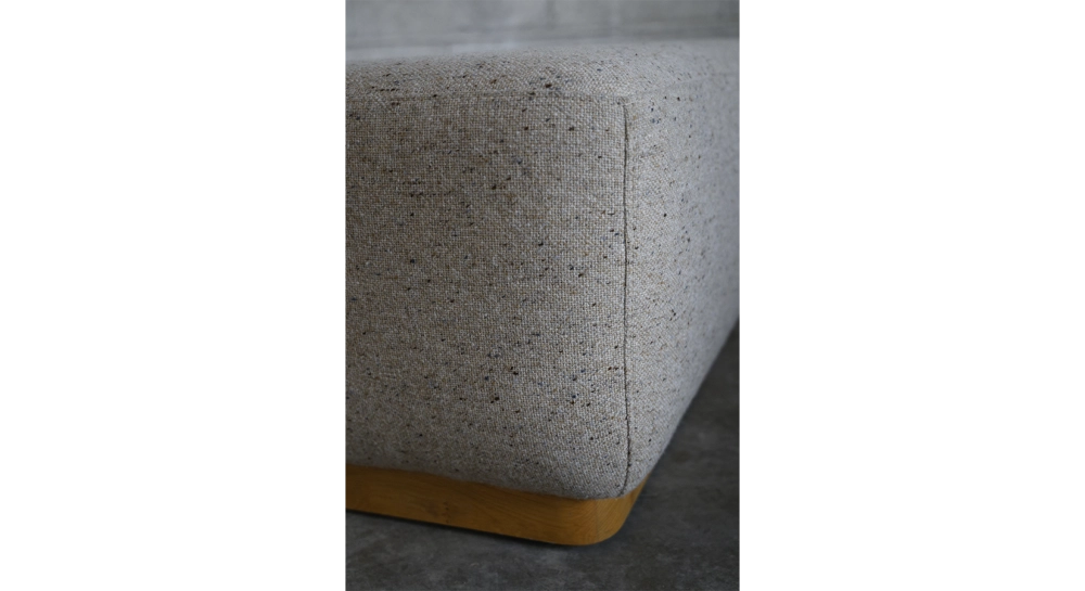 Pouf en tissu chiné beige