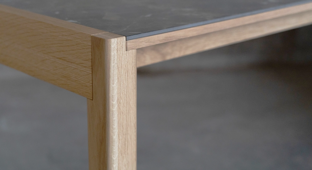 Extensible oak table for 8 to 12 people with slate effect ceramic top and anthracite tinted extensions 160x100 cm