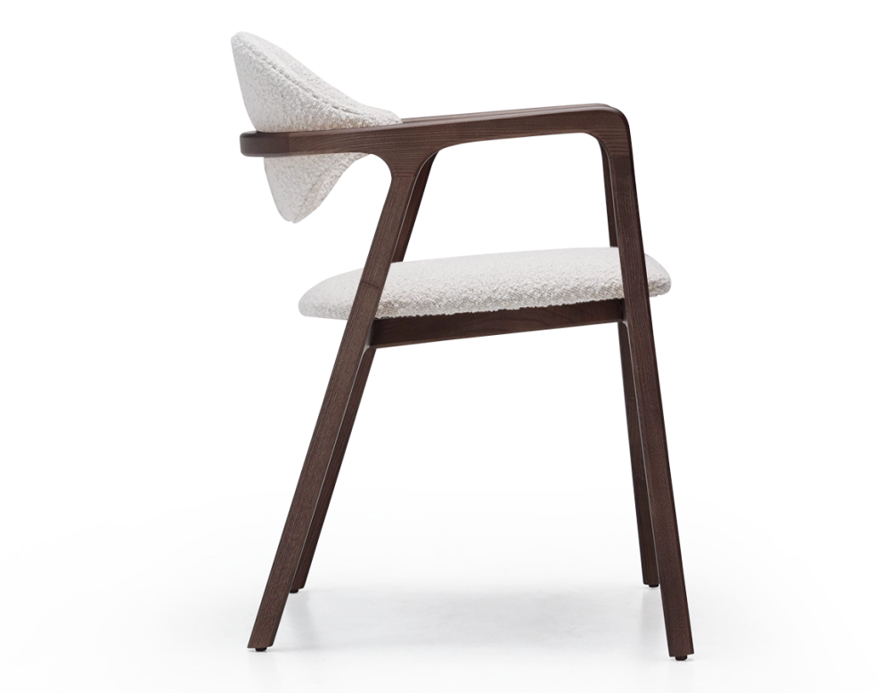 Designer armchair dark brown stained wood and white bouclé fabric. Designer armchair dark brown stained wood and white bouclé fabric.