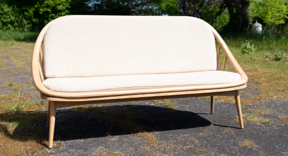 Scandinavian 2-seater sofa natural wood finish and beige fabric