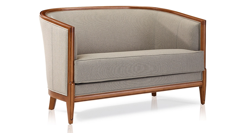 Antique 2 seater sofa with moulded armrests wood stained in an antique style and light grey fabric Antique 2 seater sofa with moulded armrests wood stained in an antique style and light grey fabric