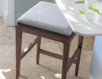 Tabouret de bar design H60 cm bois teinte noyer assise tissu beige naturel Tabouret de bar design H60 cm bois teinte noyer assise tissu beige naturel