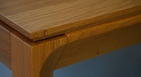 Table extensible en chêne 6 à 10 personnes avec plateau et allonges bois teinte naturelle 140x90 cm