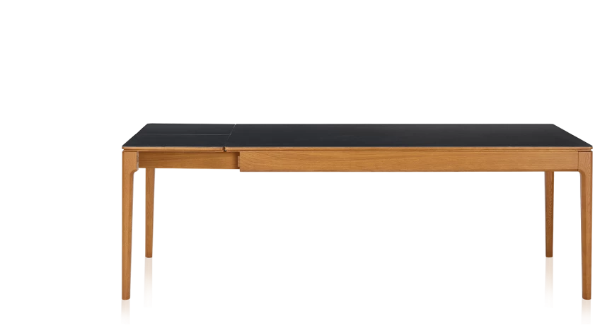Table extensible en chêne et céramique allonges céramique avec bois teinte merisier et plateau et allonges céramique noire unie 140x90 cm