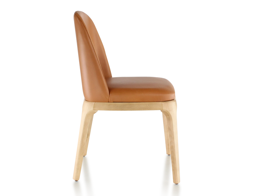 Designer chair natural stained wood and caramel leather Designer chair natural stained wood and caramel leather