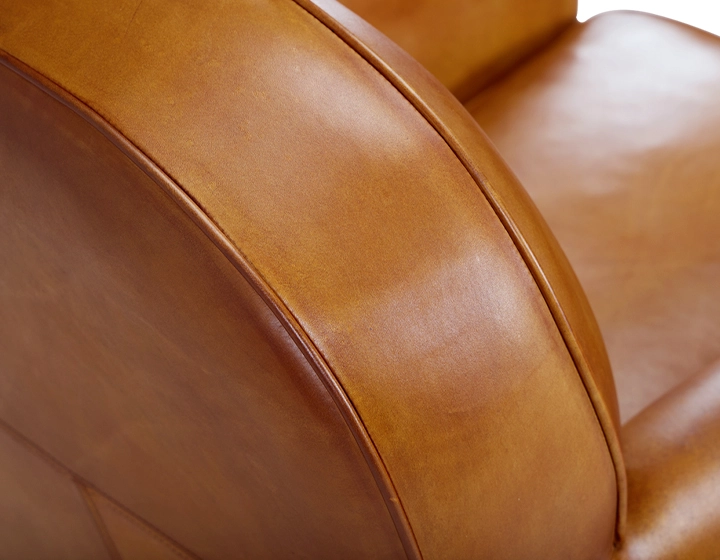 Leather club armchair cognac piped armrests Leather club armchair cognac piped armrests