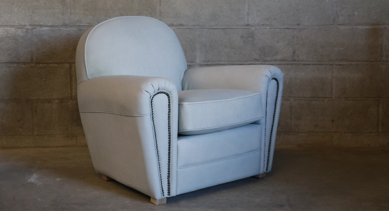 Leather club armchair dark brown studded armrests