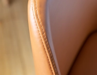 Designer chair natural stained wood and caramel leather Designer chair natural stained wood and caramel leather