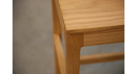 Design bar stool H60 cm wooden seat with a natural wood finish.