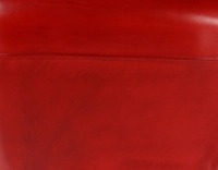 Chesterfield leather armchair red studded armrests Chesterfield leather armchair red studded armrests