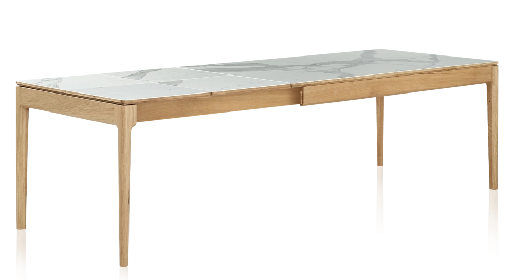 Extendable table for 8 to 12 people in oak and ceramic with ceramic extensions with natural stained wood and white marble effect ceramic top and extensions 180x100 cm