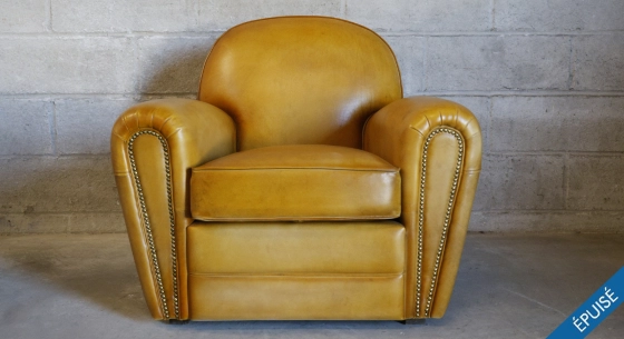 Fauteuil club cuir cognac accoudoirs cloutés