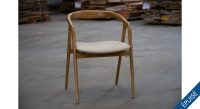 Scandinavian chair cherry wood stain with beige fabric seat. Scandinavian chair cherry wood stain with beige fabric seat.