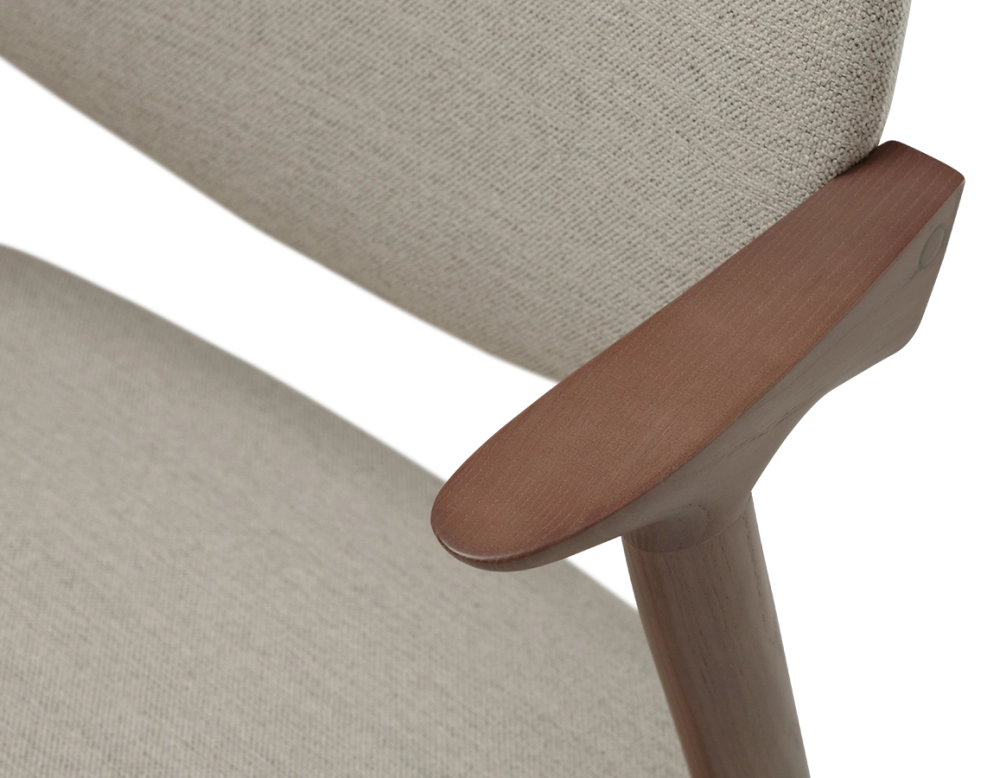 Walnut coloured design chair and natural beige fabric Walnut coloured design chair and natural beige fabric