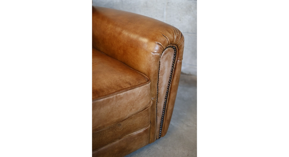 Leather club armchair dark brown studded armrests