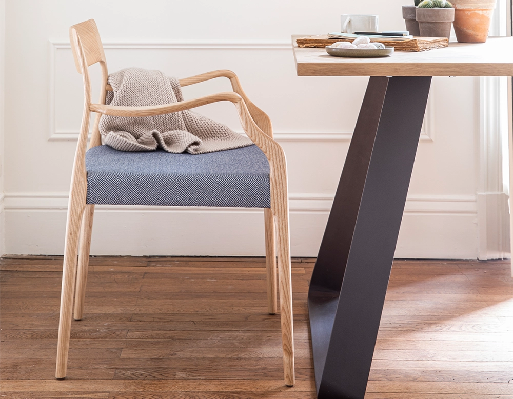 Scandinavian armchair with armrests natural stained wood, blue chevron fabric seat Scandinavian armchair with armrests natural stained wood, blue chevron fabric seat