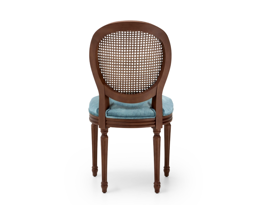 Louis XVI style antique chair dark brown stained wood with cane backrest and petrol blue velvet seat. Louis XVI style antique chair dark brown stained wood with cane backrest and petrol blue velvet seat.