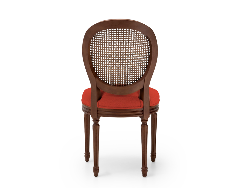 Louis XVI style antique chair dark brown stained wood with cane backrest and burnt orange fabric seat. Louis XVI style antique chair dark brown stained wood with cane backrest and burnt orange fabric seat.