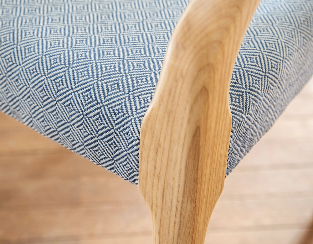 Scandinavian armchair with armrests natural stained wood, blue chevron fabric seat Scandinavian armchair with armrests natural stained wood, blue chevron fabric seat