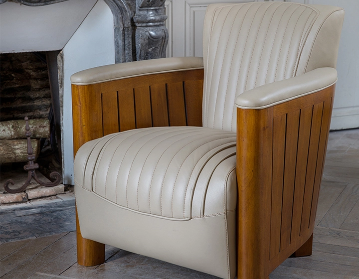 Fauteuil club bois et cuir beige Fauteuil club bois et cuir beige