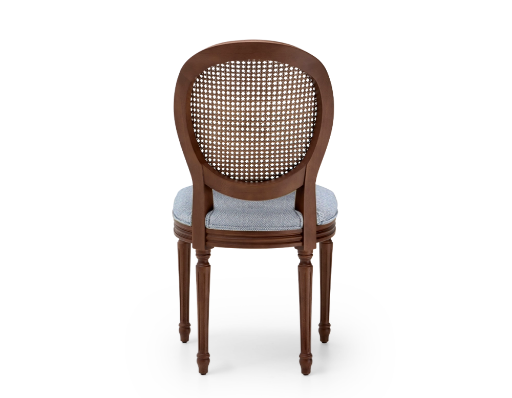 Louis XVI style antique chair dark brown stained wood with cane backrest and blue chevron fabric seat. Louis XVI style antique chair dark brown stained wood with cane backrest and blue chevron fabric seat.