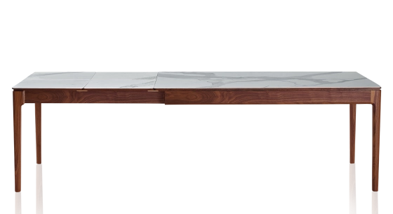 Extending table for 8 to 14 people in walnut and ceramic with ceramic extensions with natural stained wood and white marble effect ceramic top and extensions 210x100 cm