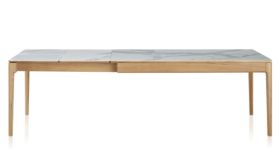 Extendable table for 8 to 12 people in oak and ceramic with ceramic extensions with natural stained wood and white marble effect ceramic top and extensions 180x100 cm