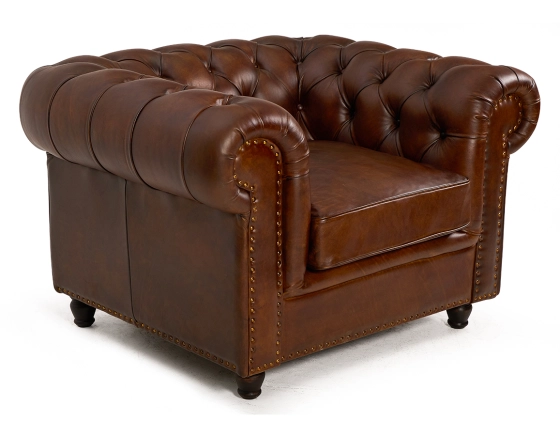 Fauteuil chesterfield cuir marron vintage accoudoirs cloutés