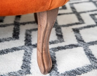 Fauteuil crapaud sans accoudoirs pieds bois teinte noyer et tissu velours terracotta Fauteuil crapaud sans accoudoirs pieds bois teinte noyer et tissu velours terracotta