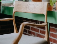 Scandinavian armchair with armrests natural wood stain camel fabric seat Scandinavian armchair with armrests natural wood stain camel fabric seat
