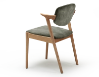 Chaise scandinave bois teinte naturelle assise tissu velours vert forêt Chaise scandinave bois teinte naturelle assise tissu velours vert forêt