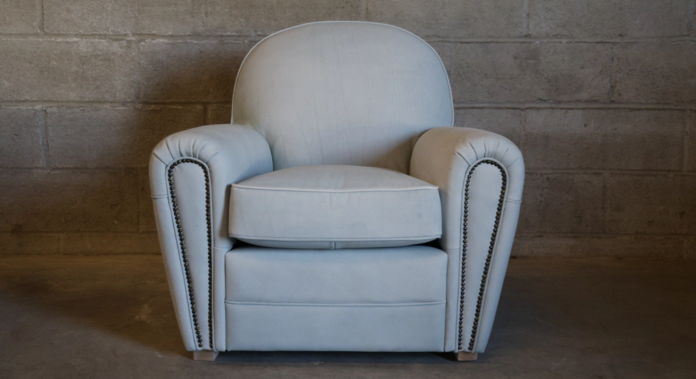 Leather club armchair dark brown studded armrests