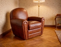 Leather club armchair vintage brown piped armrests