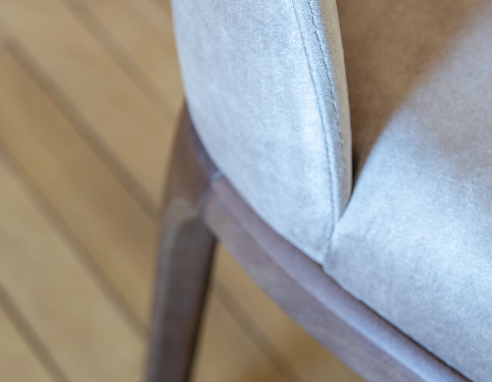 Designer chair dark brown stained wood and light taupe velvet fabric Designer chair dark brown stained wood and light taupe velvet fabric