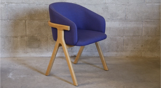 Oak chair design wood stained in xxxxx, seat upholstered in xxxxxx.