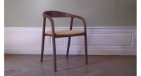 Scandinavian chair walnut wood with a pale yellow fabric seat Scandinavian chair walnut wood with a pale yellow fabric seat
