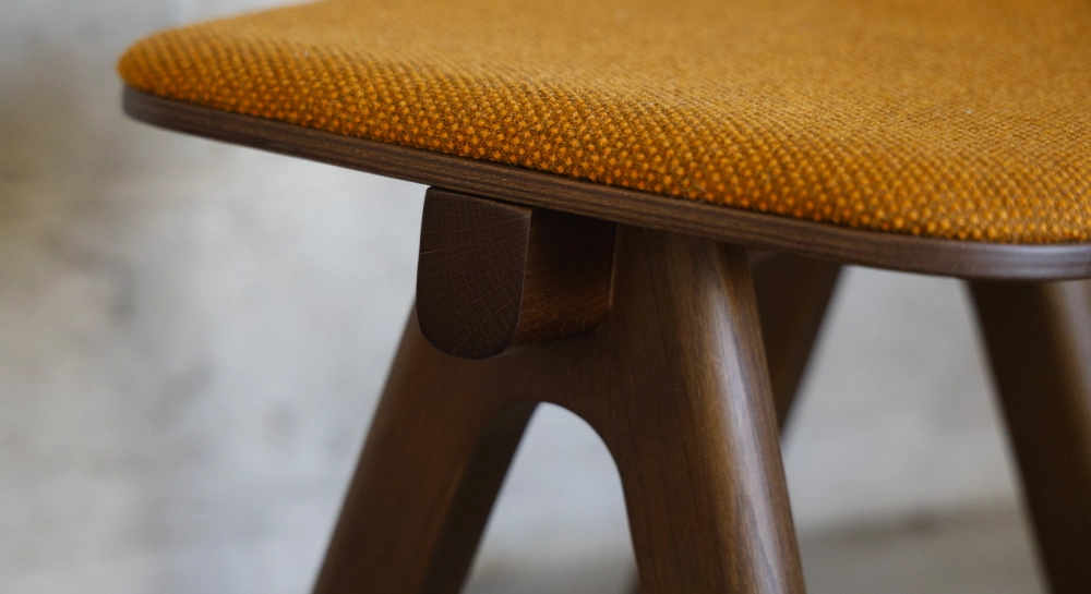 Design bar stool H65 cm natural wood finish with blue fabric seat