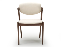 Scandinavian chair walnut-stained wood with off-white fabric seat. Scandinavian chair walnut-stained wood with off-white fabric seat.