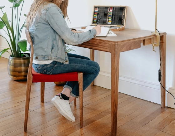 Scandinavian chair walnut-stained wood burgundy fabric seat