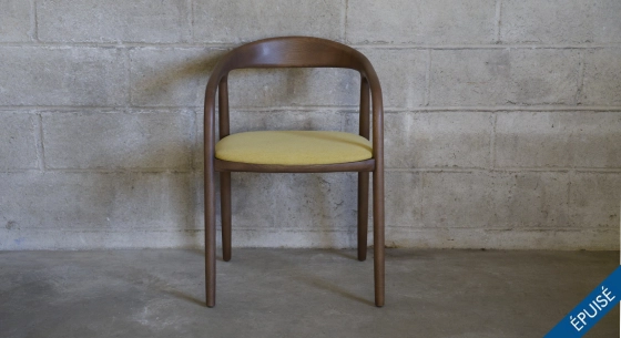 Scandinavian chair walnut wood with a pale yellow fabric seat
