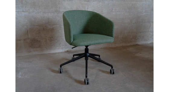 Oak chair design wood stained in xxxxx, seat upholstered in xxxxxx.