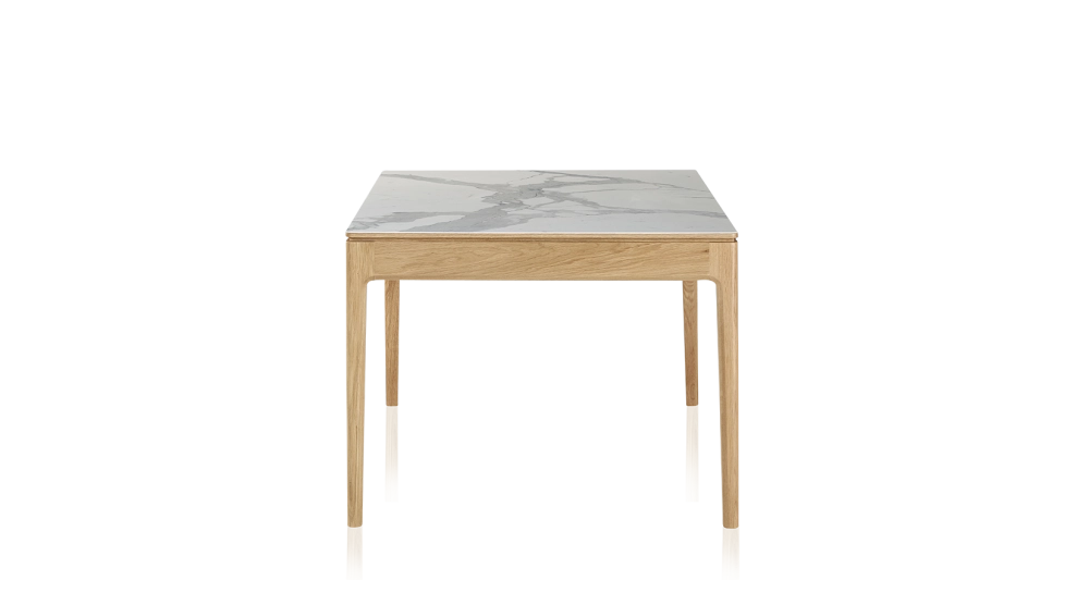Extendable table for 8 to 14 people in oak and ceramic with wooden extensions with natural stained wood and white marble effect ceramic top 210x100 cm Extendable table for 8 to 14 people in oak and ceramic with wooden extensions with natural stained wood and white marble effect ceramic top 210x100 cm