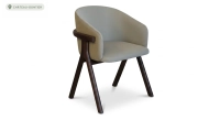 Oak chair design wood stained in xxxxx, seat upholstered in xxxxxx.