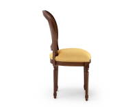 Louis XVI style antique chair dark brown stained wood with cane backrest and yellow fabric seat. Louis XVI style antique chair dark brown stained wood with cane backrest and yellow fabric seat.